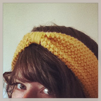 seed stitch headband in mustard yellow